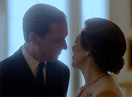As The Crown progressed forward in time, Olivia Colman & Tobias Menzies middle-aged versions of Elizabeth & Philip were rather more restrained, but still proved to be a perfect match. He is shown here giving the Queen a very sweet kiss.